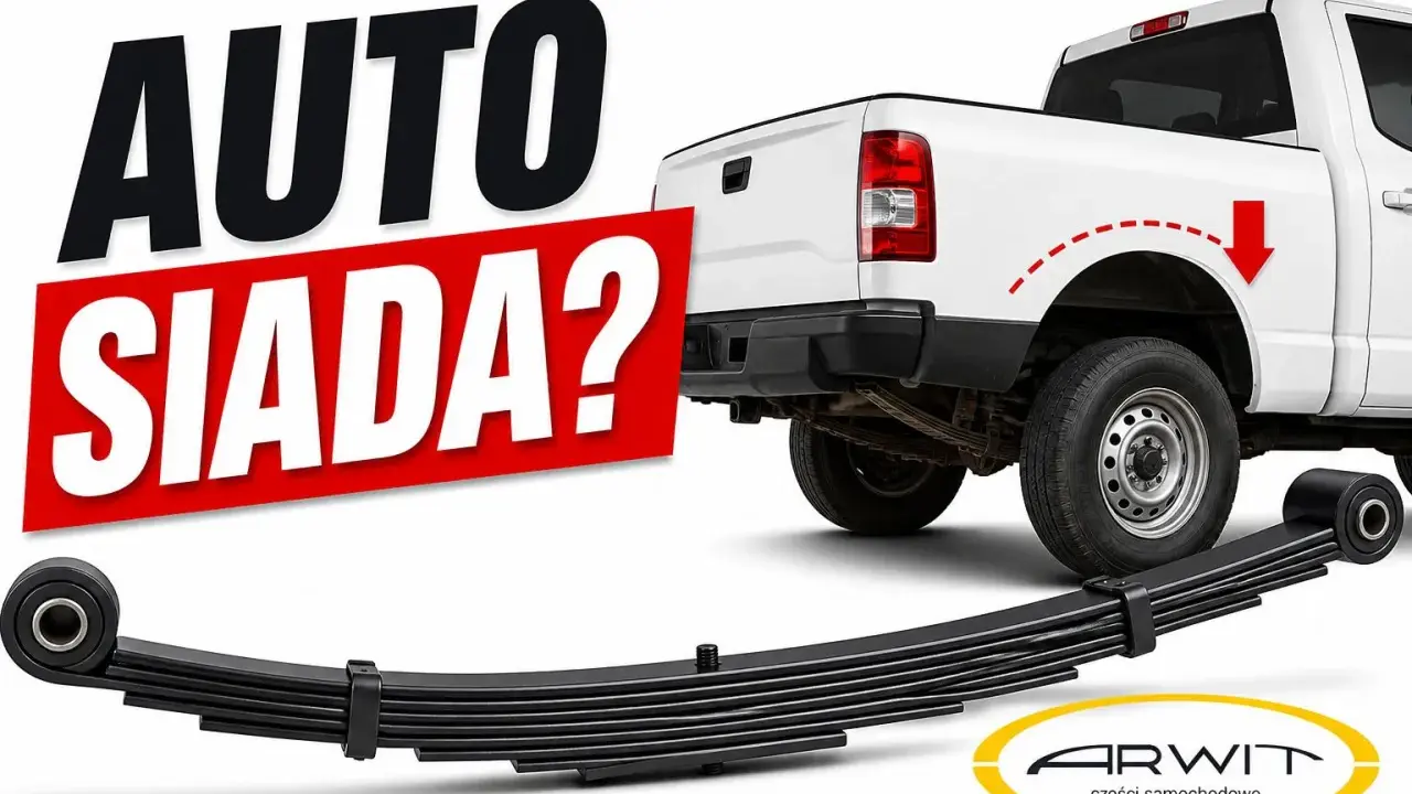 Biały pickup z napisem "AUTO SIADA?". Pod nim widać nowe resory piórowe, gotowe do montażu.