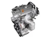Nowoczesny silnik diesla Volkswagena z turbosprężarką i paskiem napędowym.